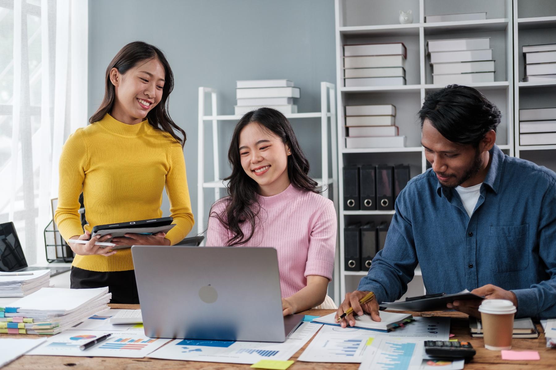 Team reviewing payroll reports together